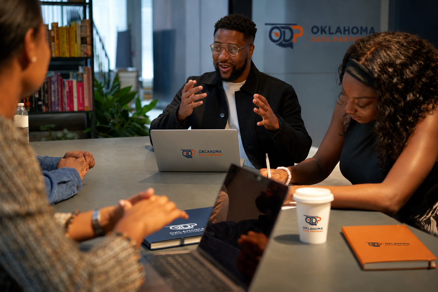 Oklahoma Data Partners data recruiting team in focused candidate discovery discussion